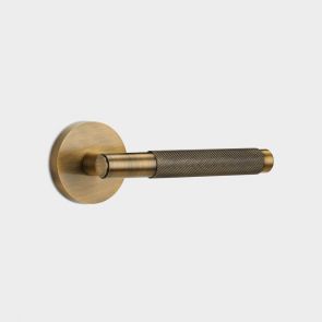 Brass Knurled Lever Door Handle in Antique Gold